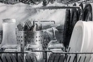 dishes being washed in a dishwasher